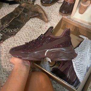 Size 7.5 Steve Madden shoes with rhinestones. Never been worn.